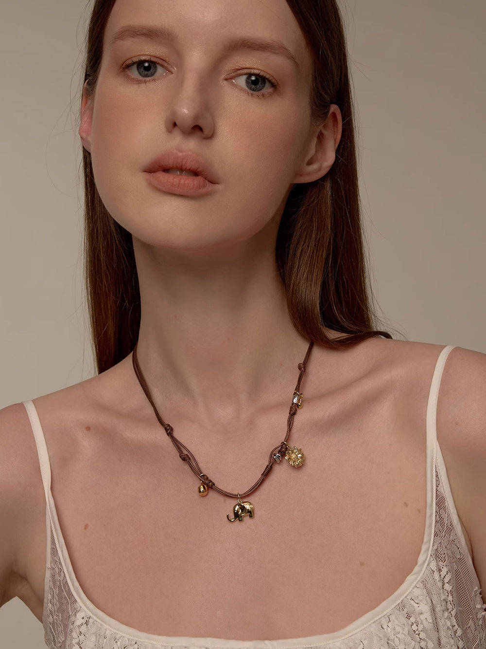 MUKTANK×SUN HUNTER Braided Necklace with Gerbera and Little Elephant Design