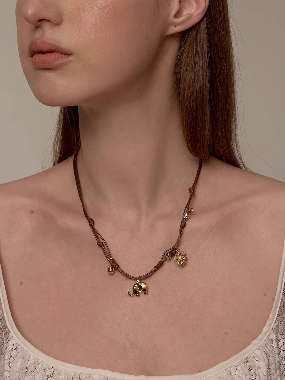 MUKTANK×SUN HUNTER Braided Necklace with Gerbera and Little Elephant Design