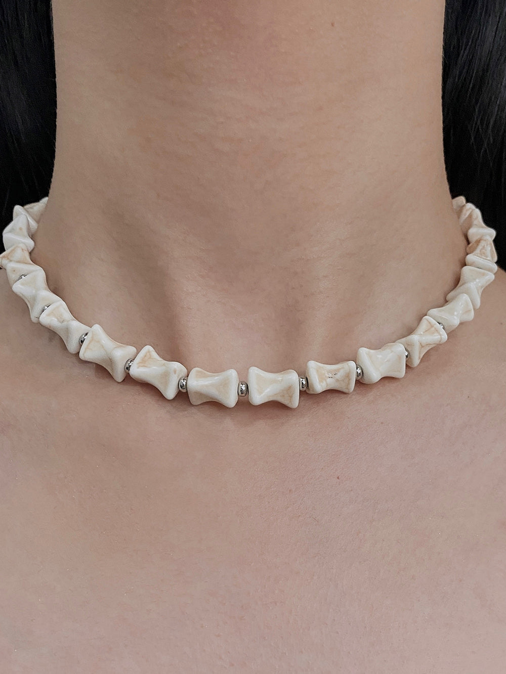 MUKTANK×DARK DREAM Wasteland-style beaded necklace with a bone-shaped design, suitable for various outfits