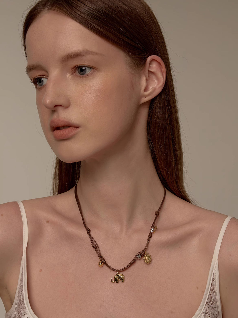 MUKTANK×SUN HUNTER Braided Necklace with Gerbera and Little Elephant Design