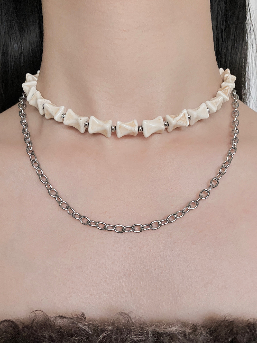 MUKTANK×DARK DREAM Wasteland-style beaded necklace with a bone-shaped design, featuring a detachable chain and multiple ways of wearing