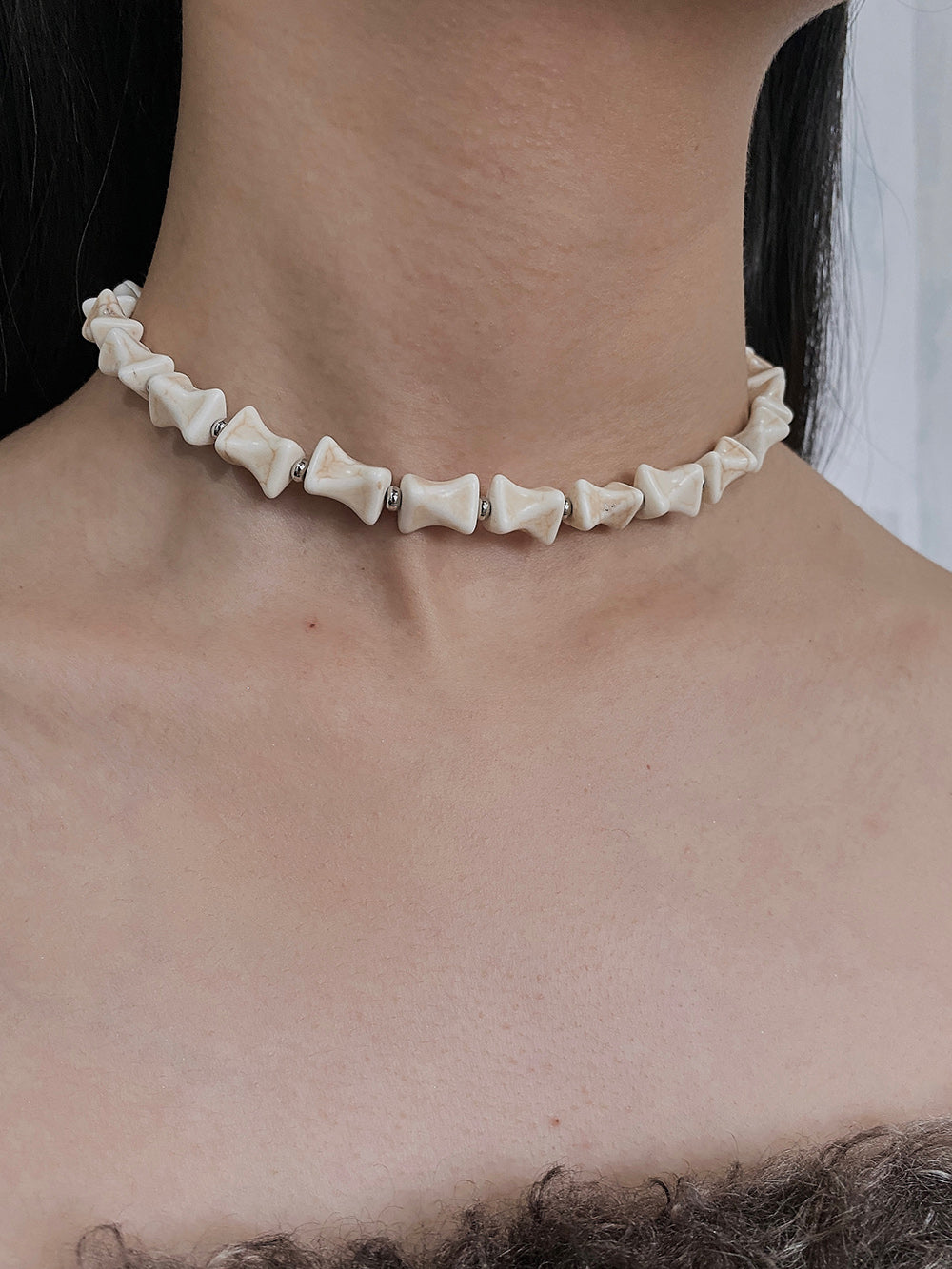 MUKTANK×DARK DREAM Wasteland-style beaded necklace with a bone-shaped design, featuring a detachable chain and multiple ways of wearing