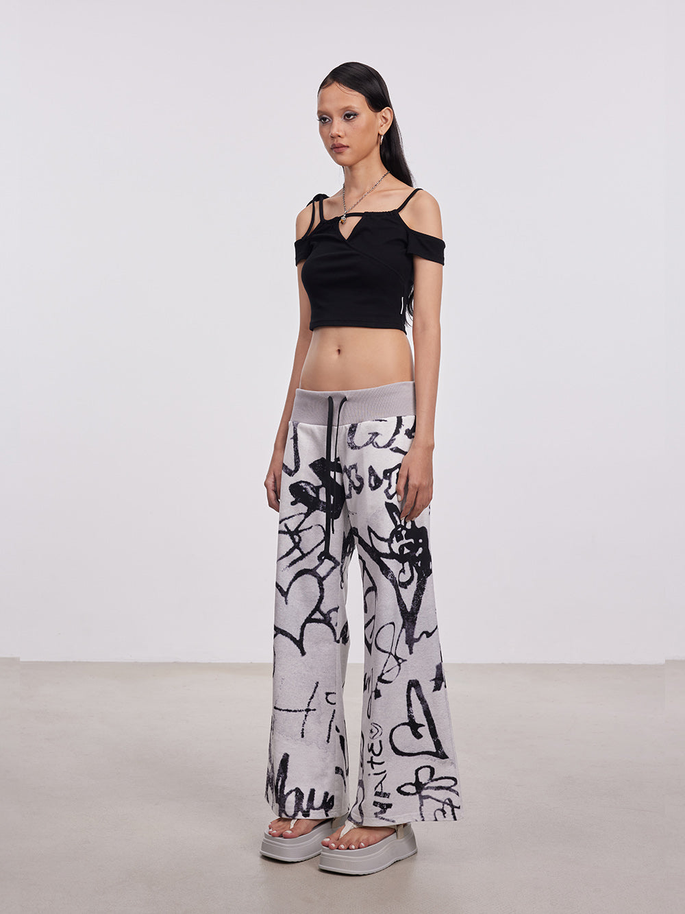 MUKTANK x Damage Asia Berlin Graffiti Low-waist Sporty Casual Pants