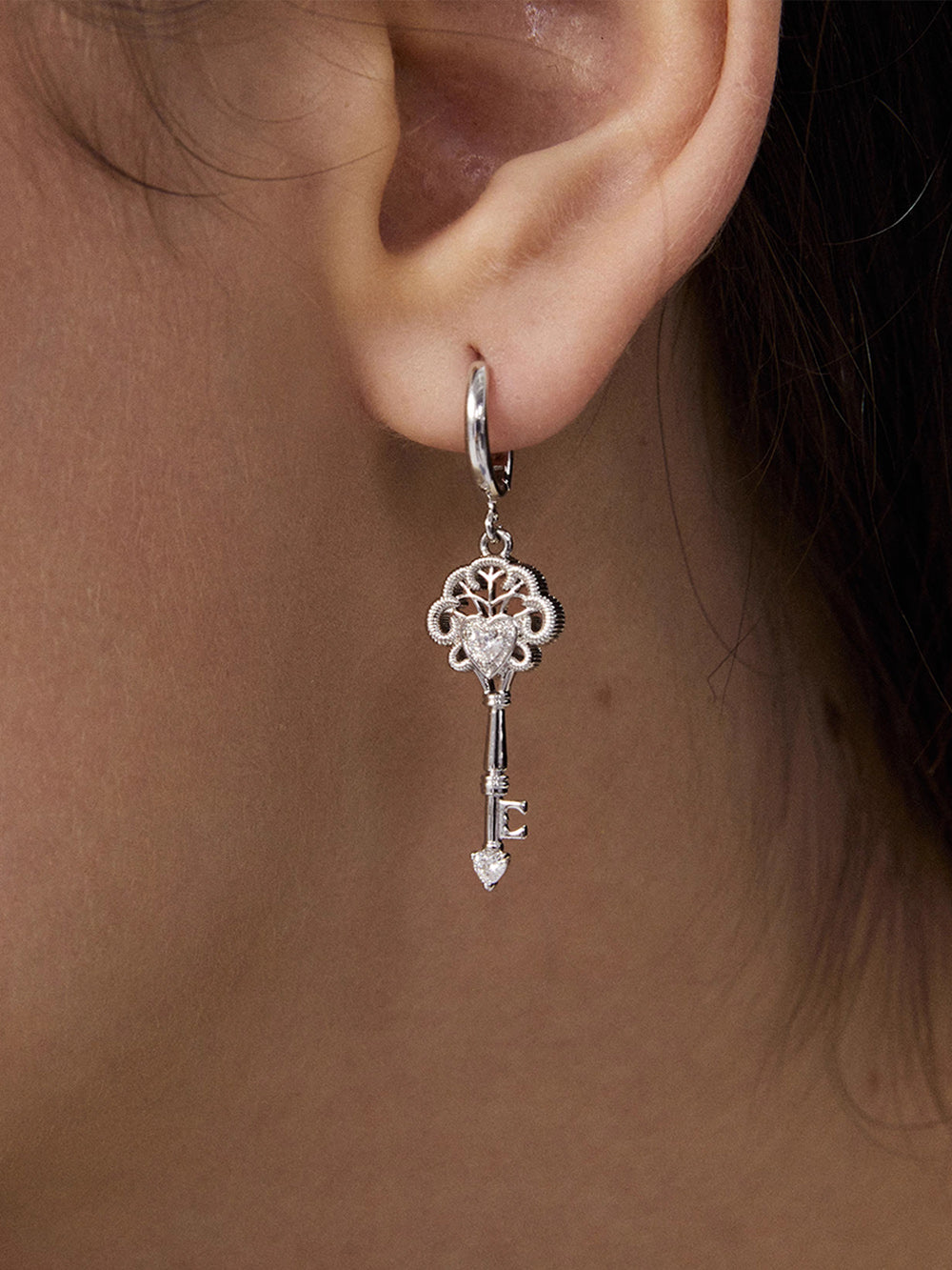 MUKTANK×SUN HUNTERLace key earrings