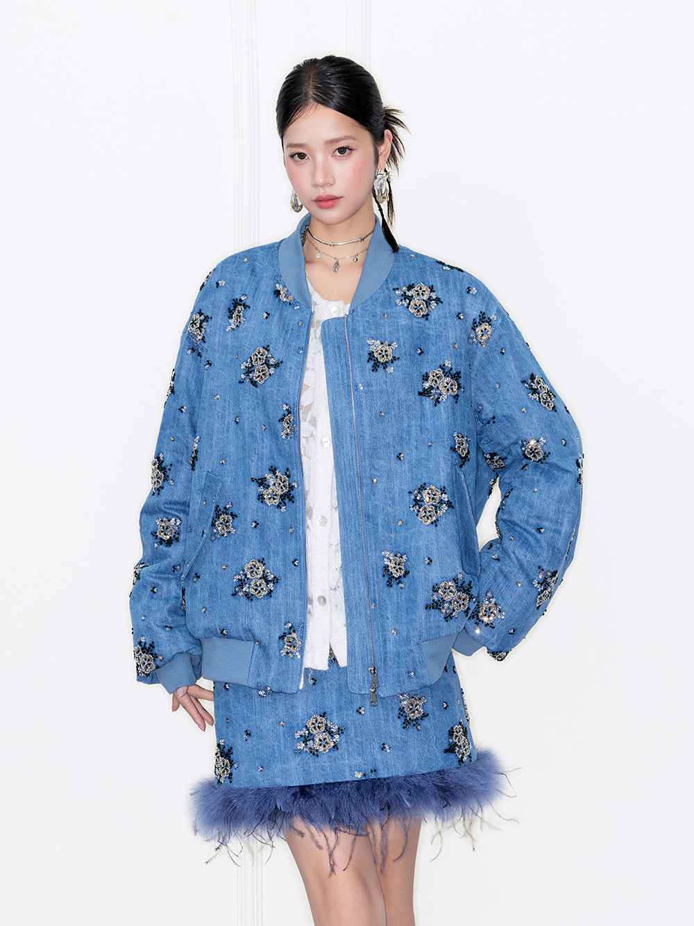 MUKZIN“Capsule Collection”Denim Mini Skirt with Feather Trim & Diamond Floral Details