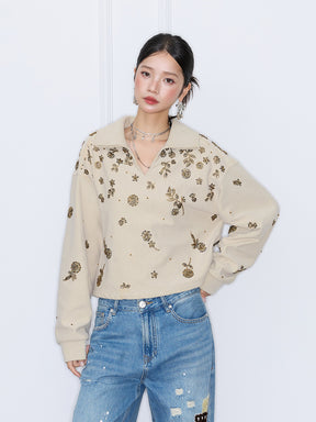 MUKZIN“Capsule Collection”Beige Collared Short Cropped Sweatshirt with Gold Sequin Floral Print