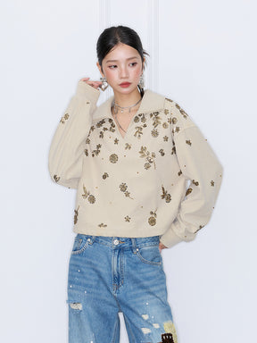 MUKZIN“Capsule Collection”Beige Collared Short Cropped Sweatshirt with Gold Sequin Floral Print
