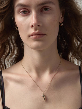 MUKTANK×SUN HUNTER Embossed Iris Tooth Pendant Necklace